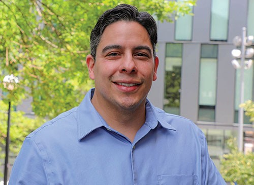 Nick Castro standing outside Lindner Hall